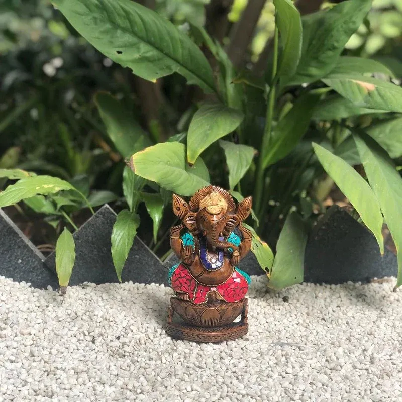 Wooden Ganesh on Kamal with Stone